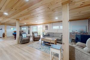 a living room with a couch and a table at Lake Life in Blairsville