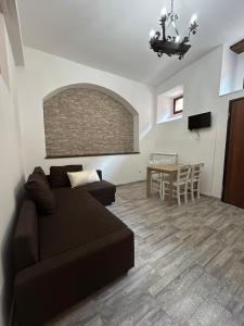 Posezení v ubytování GUBBIO LIVING - By Angeloni