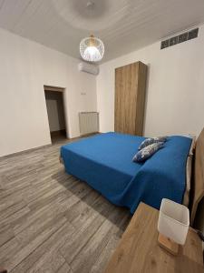 Ένα ή περισσότερα κρεβάτια σε δωμάτιο στο GUBBIO LIVING - By Angeloni