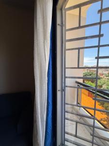 a window in a room with a view at Haven Saly in Saly Portudal