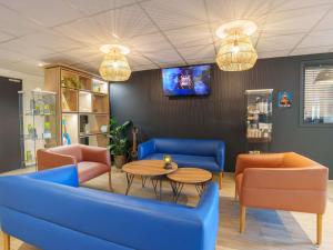 Χώρος καθιστικού στο Ibis Laon - Hôtel Restaurant