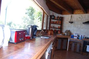 Kuchyň nebo kuchyňský kout v ubytování Casa Rural La Marta