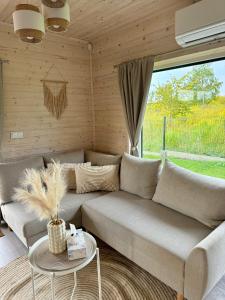 Afbeelding uit fotogalerij van Domki nad jeziorem Dadaj in Kojtryny +10 foto's