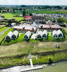 an aerial view of a house on an island at Mase waterunits 6 & 7 in Maaseik