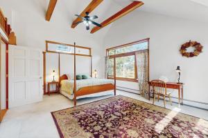 a bedroom with a bed and a window at Mike's House in Irasville +23 photos