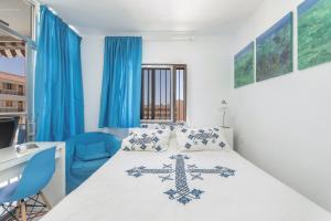 Ένα ή περισσότερα κρεβάτια σε δωμάτιο στο Apto Feliz Playa Los Cristianos +15 φωτογραφίες