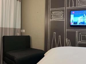 Μια τηλεόραση ή/και κέντρο ψυχαγωγίας στο IBIS Lyon Sud Chasse Sur Rhône