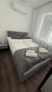 Postel nebo postele na pokoji v ubytování Z Apartman