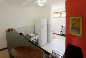 Una cocina o zona de cocina en Manacá Flat
