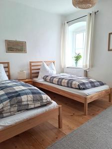 Postel nebo postele na pokoji v ubytování Seidlhaus