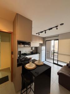 Dapur atau dapur kecil di Studio novo e completo