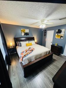 a bedroom with a bed and a ceiling fan at Home Away from Home in Fitzgerald