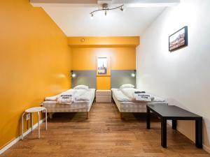 Tempat tidur dalam kamar di Mosebacke Hostel