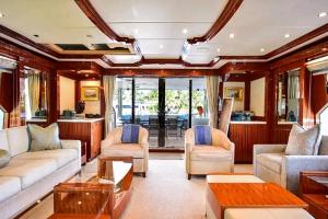 a living room with a couch and chairs and a table at Wasini Full moon Yatch in Wasini