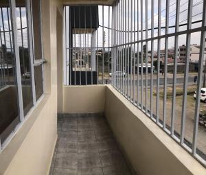 a balcony in a building with a view of a street at Atlantis City BnB in Nakuru