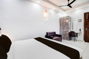 Ένα ή περισσότερα κρεβάτια σε δωμάτιο στο Townhouse ROYAL ELAN