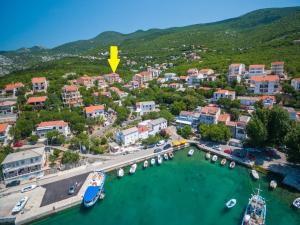 an aerial view of a harbor with boats in the water at Apartment Black@white in Klenovica