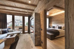 Postel nebo postele na pokoji v ubytování Hotel Cappella