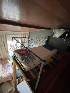 Ένα ή περισσότερα κρεβάτια σε δωμάτιο στο Magia House