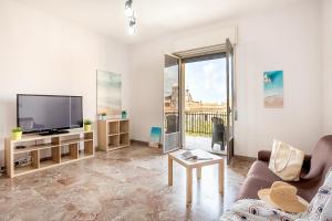 TV a/nebo společenská místnost v ubytování Casa Corso Mare Villa