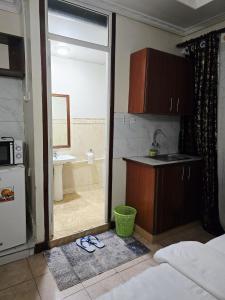 Η κουζίνα ή μικρή κουζίνα στο Abby's City Studio