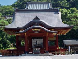 a temple with a roof on top of it at Dali's Nest Kamakura in Kamakura