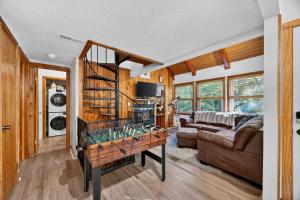 a living room with a foosball table in a room at Mountain Escape with Games & Stargazing cabin in Basye