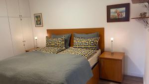 Postel nebo postele na pokoji v ubytování SOKO Guesthouse & Garden