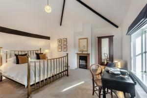 Ένα ή περισσότερα κρεβάτια σε δωμάτιο στο Bessingham Mews