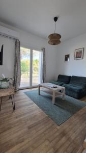 Χώρος καθιστικού στο Appartement en maison d'hôtes