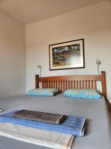 Giường trong phòng chung tại IGOR ROOMS