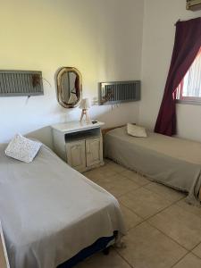 Giường trong phòng chung tại Posada El Descanso