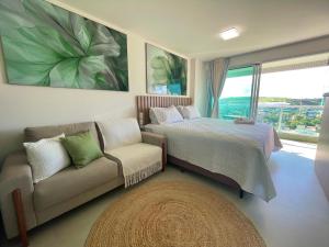 En eller flere senge i et værelse på RN Studio Premium 1001 Lateral Mar