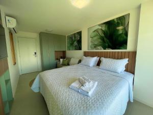 En eller flere senge i et værelse på RN Studio Premium 1001 Lateral Mar