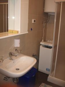 Koupelna v ubytování Apartments Alen
