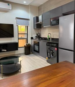 Η κουζίνα ή μικρή κουζίνα στο CozyHomes