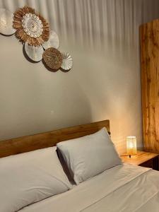 Ένα ή περισσότερα κρεβάτια σε δωμάτιο στο Aitheros