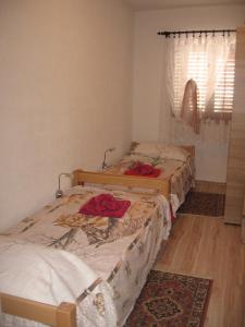 Postel nebo postele na pokoji v ubytování Apartments Alen