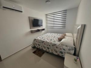 Katil atau katil-katil dalam bilik di Nice downtown apartment Irala Building 452 +7 gambar