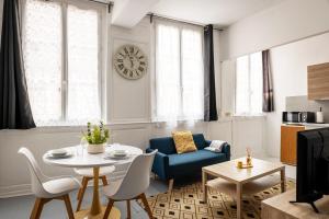 Posezení v ubytování Au cœur de Rouen + 23 fotografií