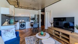 Η κουζίνα ή μικρή κουζίνα στο The Bridgewater collection 411- Luxury 1 bed Morden Apartment at Century City