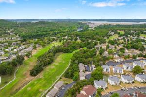 an aerial view of a town with houses and trees at Top Notch - Condo for 6 in Branson