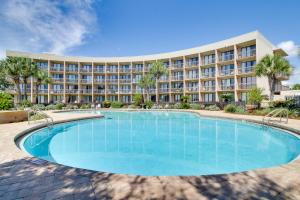 a large swimming pool in front of a hotel at Pirates Bay A106 in Fort Walton Beach