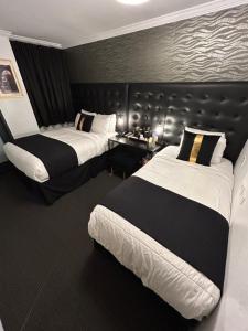a hotel room with two beds in a room at Hotel Richland LES in New York +60 photos