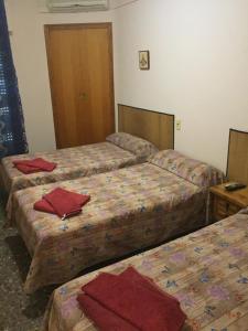 Postel nebo postele na pokoji v ubytování Hostal L'Escaleta