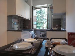 Η κουζίνα ή μικρή κουζίνα στο M1Sesto Marelli Holiday Home +7 φωτογραφίες