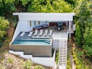 an overhead view of a house with a swimming pool at Villa Vista Bahia in Coco