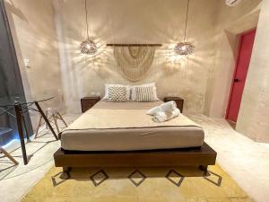 Ένα ή περισσότερα κρεβάτια σε δωμάτιο στο Habitacion con alberca privada