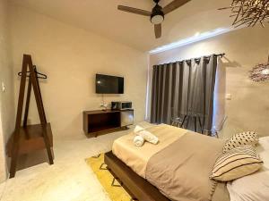 Ένα ή περισσότερα κρεβάτια σε δωμάτιο στο Habitacion con alberca privada
