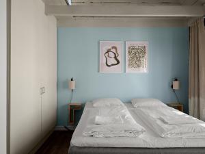 Ένα ή περισσότερα κρεβάτια σε δωμάτιο στο Unique apartment in Stavangers most sentral square